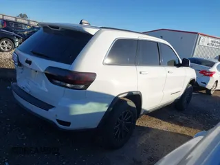 2017 Jeep Grand Cherokee Laredo with VIN 1C4RJEAG1HC903264, listed as a IAAI auction lot 40606675 with 144,106 mi miles. Bid and sale history available at carsss.com. Image 4.