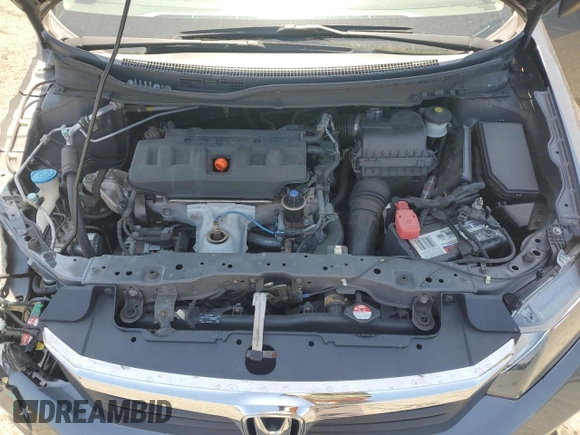 2012 Honda Civic LX z VIN 2HGFB2F59CH603985, wystawiony jako Copart lot #55675435 z przebiegiem 125 567 mil mil oraz Szkoda całkowita • Salvage title. Historia ofert i sprzedaży dostępna na DreamBid. Obrazek 11.