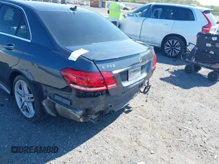 2014 Mercedes-Benz E 350 Sport with VIN WDDHF5KB8EA985121, listed as a IAAI auction lot 42124448 with 96,412 mi miles and . Bid and sale history available at DreamBid. Image 6.