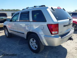 2007 Jeep Grand Cherokee Laredo with VIN 1J8HR48P87C687411, listed as a IAAI auction lot 41774029 with 212,763 mi miles. Bid and sale history available at carsss.com. Image 3.