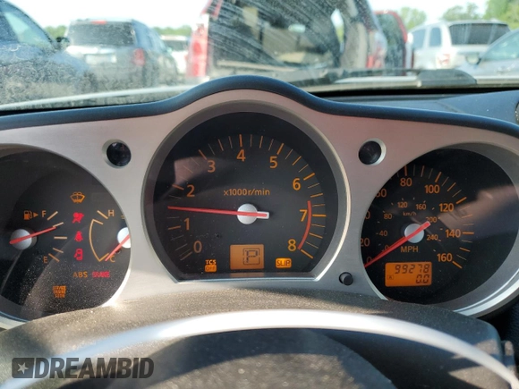2005 Nissan 350Z Touring z VIN JN1AZ36A95M751810, wystawiony jako Copart lot #55104085 z przebiegiem 99 278 mil mil oraz Szkoda całkowita • Salvage title. Historia ofert i sprzedaży dostępna na DreamBid. Obrazek 9.