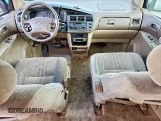 2000 Toyota Sienna LE with VIN 4T3ZF13C2YU218417, listed as a Copart auction lot 63328035 with 263,439 mi miles and Salvage title. Bid and sale history available at DreamBid. Image 8.