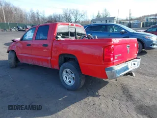 2006 Dodge Dakota SLT with VIN 1D7HE48K76S505943, listed as a IAAI auction lot 41410318 with 224,123 mi miles and . Bid and sale history available at carsss.com. Image 3.
