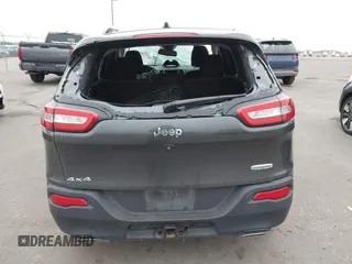 2015 Jeep Cherokee Latitude with VIN 1C4PJMCS2FW755219, listed as a IAAI auction lot 41830715 with 113,097 mi miles. Bid and sale history available at carsss.com. Image 16.