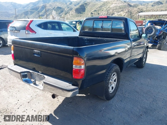 2002 Toyota Tacoma z VIN 5TENL42N92Z064523, wystawiony jako IAAI lot #42228845 z przebiegiem 305 172 mil mil oraz . Historia ofert i sprzedaży dostępna na DreamBid. Obrazek 4.