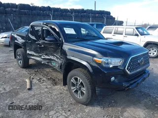 2019 Toyota Tacoma SR z VIN 3TMCZ5AN1KM232424, wystawiony jako IAAI lot #41582177 z przebiegiem 38 310 mil mil oraz . Historia ofert i sprzedaży dostępna na DreamBid. Obrazek 1.