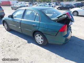 2001 Honda Civic LX with VIN 2HGES16551H567764, listed as a IAAI auction lot 41908288 with 137,740 mi miles. Bid and sale history available at carsss.com. Image 3.