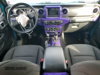 2020 Jeep Wrangler Unlimited Sport S with VIN 1C4HJXDG9LW215121, listed as a Copart auction lot 51292305 with 35,100 mi miles and Salvage title. Bid and sale history available at DreamBid. Image 8.