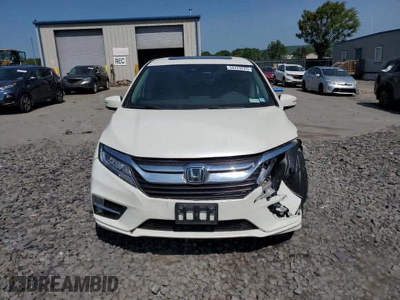 2019 Honda Odyssey Touring with VIN 5FNRL6H81KB051846, listed as a Copart auction lot 58723015 with 68,142 mi miles and Salvage title. Bid and sale history available at DreamBid. Image 5.