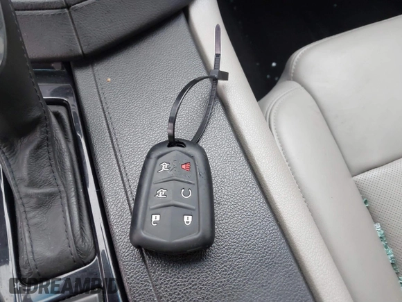 2014 Cadillac CTS Luxury AWD with VIN 1G6AX5S33E0156239, listed as a IAAI auction lot 41452922 with Not Provided miles and . Bid and sale history available at DreamBid. Image 11.