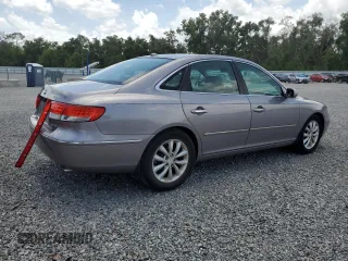 2007 Hyundai Azera SE z VIN KMHFC46FX7A216846, wystawiony jako Copart lot #60035695 z przebiegiem 197 201 mil mil oraz Szkoda całkowita • Salvage title. Historia ofert i sprzedaży dostępna na DreamBid. Obrazek 3.