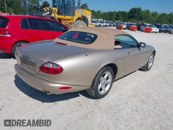 2002 Jaguar XK with VIN SAJDA42C32NA24378, listed as a IAAI auction lot 42205854 with 92,612 mi miles and . Bid and sale history available at DreamBid. Image 4.
