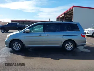 2007 Honda Odyssey EX-L with VIN 5FNRL38677B021464, listed as a IAAI auction lot 41568582 with 131,359 mi miles and . Bid and sale history available at DreamBid. Image 14.