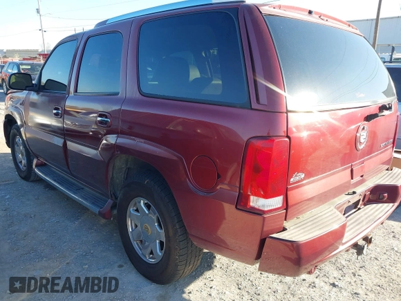 2003 Cadillac Escalade z VIN 1GYEC63T63R132602, wystawiony jako IAAI lot #41778576 z przebiegiem 242 443 mil mil oraz . Historia ofert i sprzedaży dostępna na DreamBid. Obrazek 3.