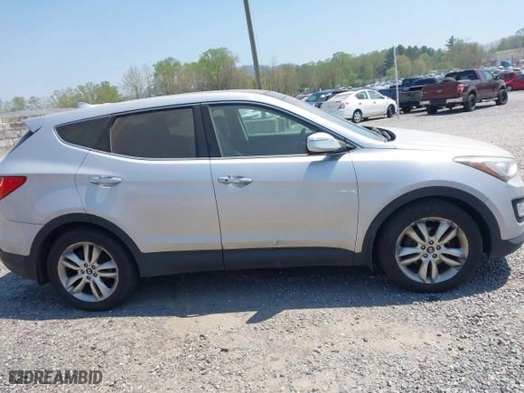 2013 Hyundai Santa Fe 2.0T Sport with VIN 5XYZWDLAXDG057954, listed as a IAAI auction lot 42082667 with 186,678 mi miles. Bid and sale history available at carsss.com. Image 13.