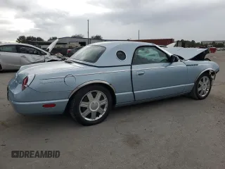 2004 Ford Thunderbird Deluxe with VIN 1FAHP60A44Y111156, listed as a Copart auction lot 79000014 with 42,101 mi miles and Salvage Title. Bid and sale history available at DreamBid. Image 3.