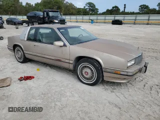 1991 Cadillac Eldorado z VIN 1G6EL13B4MU604636, wystawiony jako Copart lot #79155234 z przebiegiem Nie podano mil oraz Nie do naprawy. Historia ofert i sprzedaży dostępna na DreamBid. Obrazek 4.