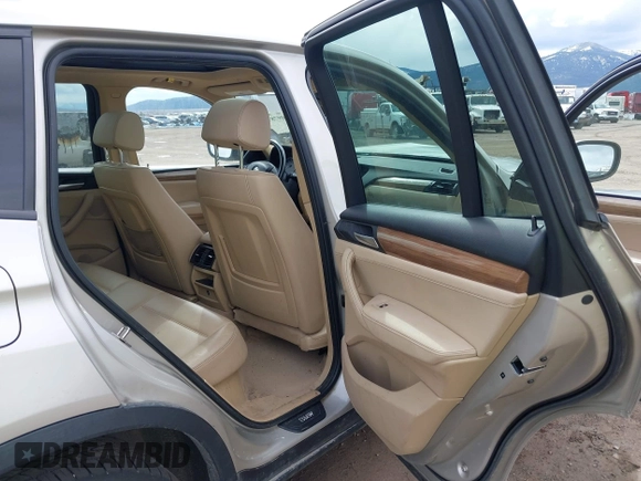 2013 BMW X3 xDrive28i with VIN 5UXWX9C5XD0A24038, listed as a IAAI auction lot 41909787 with 82,857 mi miles and . Bid and sale history available at DreamBid. Image 8.