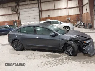 2025 Tesla Model 3 Long Range with VIN 5YJ3E1EB4SF913766, listed as a IAAI auction lot 41975164 with 3,099 mi miles and . Bid and sale history available at DreamBid. Image 12.