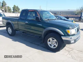 2001 Toyota Tacoma z VIN 5TEWN72N41Z776761, wystawiony jako IAAI lot #41960185 z przebiegiem 217 619 mil mil oraz . Historia ofert i sprzedaży dostępna na DreamBid. Obrazek 1.