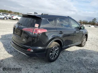 2016 Toyota RAV4 Hybrid XLE with VIN JTMRJREV2GD059101, listed as a Copart auction lot 69439222 with 74,915 mi miles. Bid and sale history available at carsss.com. Image 3.