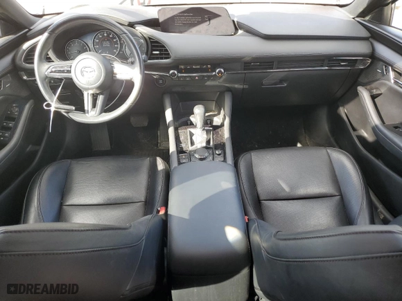 2020 Mazda Mazda3 Hatchback Premium Package with VIN JM1BPBNM7L1155767, listed as a Copart auction lot 75656714 with 57,573 mi miles and Salvage Title. Bid and sale history available at carsss.com. Image 8.