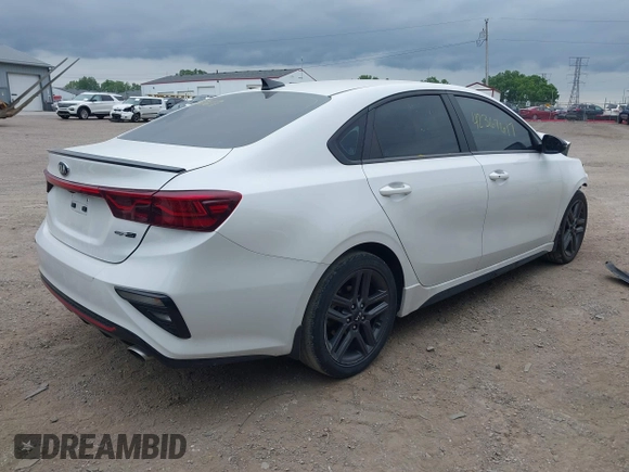 2021 Kia Forte GT-Line z VIN 3KPF34AD9ME333644, wystawiony jako IAAI lot #42367617 z przebiegiem 58 791 mil mil oraz . Historia ofert i sprzedaży dostępna na DreamBid. Obrazek 4.