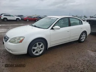 2003 Nissan Altima SE z VIN 1N4BL11E83C345611, wystawiony jako Copart lot #56047145 z przebiegiem 145 617 mil mil oraz Czysty tytuł • Clean title. Historia ofert i sprzedaży dostępna na DreamBid. Obrazek 1.