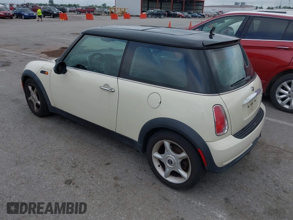 2006 MINI Hardtop with VIN WMWRC33566TK73763, listed as a IAAI auction lot 42782654 with 103,751 mi miles and . Bid and sale history available at DreamBid. Image 3.