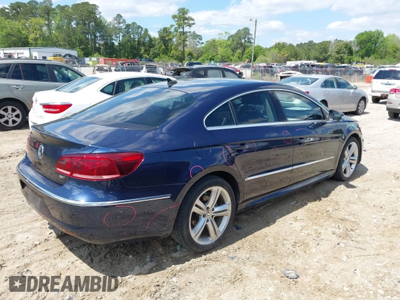 2014 Volkswagen CC R-Line with VIN WVWBP7AN7EE507463, listed as a IAAI auction lot 41984136 with 100,531 mi miles. Bid and sale history available at carsss.com. Image 4.