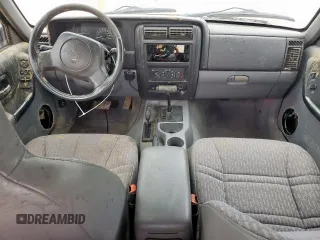 1998 Jeep Cherokee Sport z VIN 1J4FJ68S8WL193483, wystawiony jako Copart lot #58368705 z przebiegiem 94 462 mil mil oraz Szkoda całkowita • Salvage title. Historia ofert i sprzedaży dostępna na DreamBid. Obrazek 8.