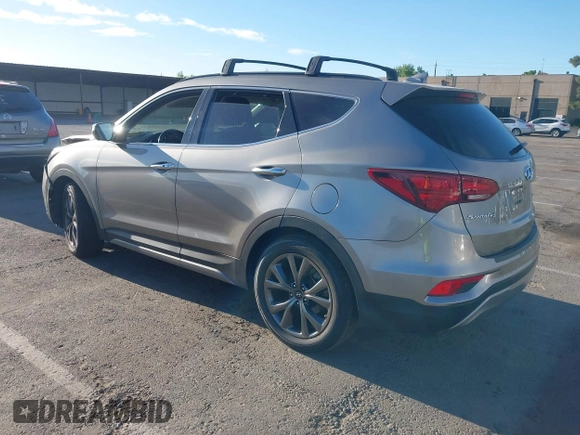 2018 Hyundai Santa Fe Ultimate z VIN 5XYZW4LA1JG515019, wystawiony jako IAAI lot #42248389 z przebiegiem 60 222 mil mil oraz . Historia ofert i sprzedaży dostępna na DreamBid. Obrazek 3.