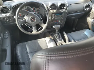 2006 GMC Envoy SLE z VIN 1GKDS13S062176000, wystawiony jako Copart lot #57672995 z przebiegiem 161 455 mil mil oraz Szkoda całkowita • Salvage title. Historia ofert i sprzedaży dostępna na DreamBid. Obrazek 8.