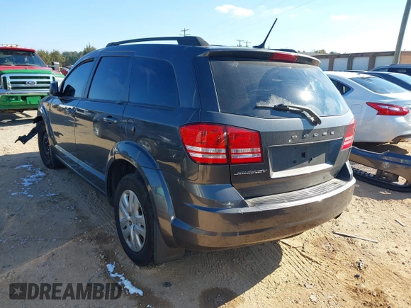 2018 Dodge Journey SE with VIN 3C4PDCABXJT183318, listed as a IAAI auction lot 40985444 with 164,051 mi miles. Bid and sale history available at carsss.com. Image 3.