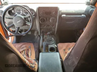 2010 Jeep Wrangler Rubicon with VIN 1J4BA6D12AL186887, listed as a Copart auction lot 57902545 with Not provided miles and Salvage title. Bid and sale history available at DreamBid. Image 8.