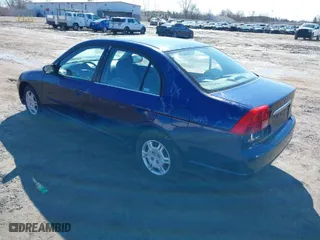 2001 Honda Civic EX with VIN 1HGES26721L044003, listed as a IAAI auction lot 41780606 with 213,515 mi miles. Bid and sale history available at carsss.com. Image 3.