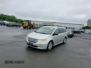 2011 Honda Odyssey Touring with VIN 5FNRL5H99BB021223, listed as a Copart auction lot 61171775 with 194,029 mi miles and Salvage title. Bid and sale history available at DreamBid. Image 15.