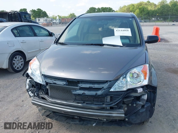 2011 Honda CR-V SE with VIN 5J6RE4H43BL089811, listed as a IAAI auction lot 42144060 with 212,559 mi miles and . Bid and sale history available at carsss.com. Image 6.
