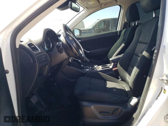 2016 Mazda CX-5 Touring with VIN JM3KE2CY7G0657113, listed as a Copart auction lot 46489835 with 166,399 mi miles and Salvage Title. Bid and sale history available at DreamBid. Image 7.