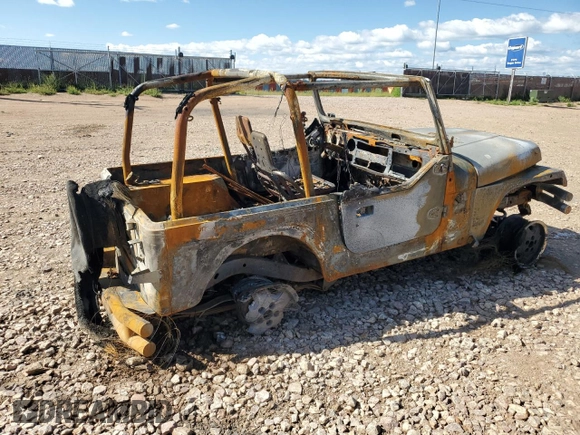 1992 Jeep Wrangler z VIN 2J4FY19P5NJ502467, wystawiony jako Copart lot #77054933 z przebiegiem Nie podano mil oraz Czysty tytuł • Clean title. Historia ofert i sprzedaży dostępna na DreamBid. Obrazek 3.