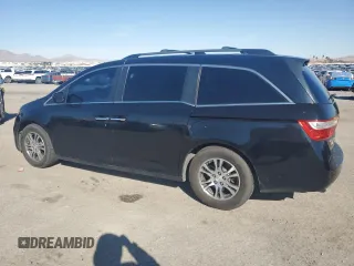 2012 Honda Odyssey EX-L with VIN 5FNRL5H64CB052869, listed as a Copart auction lot 47685375 with 168,449 mi miles and Salvage Title. Bid and sale history available at DreamBid. Image 2.