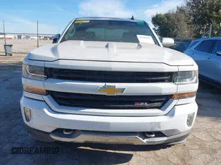 2017 Chevrolet Silverado 1500 LT with VIN 3GCUKREC4HG466329, listed as a IAAI auction lot 41305052 with 57,844 mi miles and . Bid and sale history available at DreamBid. Image 6.