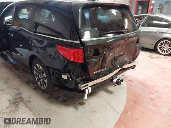 2024 Honda Odyssey EX-L with VIN 5FNRL6H65RB018633, listed as a IAAI auction lot 41801512 with 22,103 mi miles and . Bid and sale history available at DreamBid. Image 6.