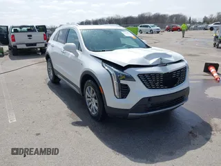 2020 Cadillac XT4 AWD Premium Luxury z VIN 1GYFZDR44LF036461, wystawiony jako IAAI lot #41934371 z przebiegiem 90 545 mil mil oraz . Historia ofert i sprzedaży dostępna na DreamBid. Obrazek 1.