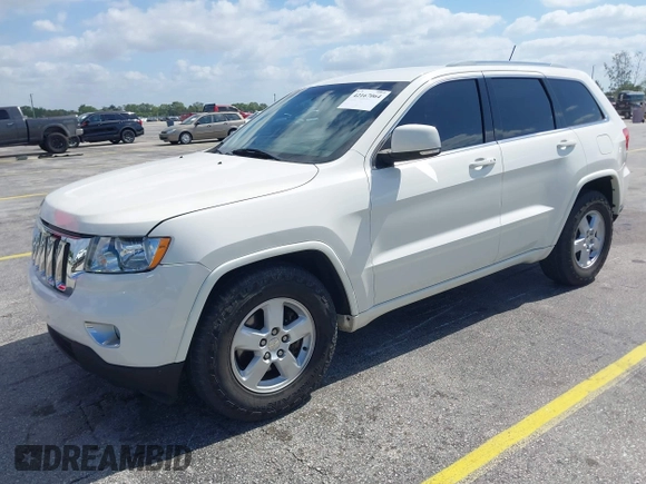 2011 Jeep Grand Cherokee Laredo with VIN 1J4RS4GG0BC573388, listed as a IAAI auction lot 42167064 with 63,363 mi miles and . Bid and sale history available at DreamBid. Image 2.