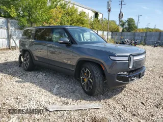 2023 Rivian R1S Adventure z VIN 7PDSGABAXPN010623, wystawiony jako Copart lot #72176294 z przebiegiem Nie podano mil oraz Szkody całkowita. Historia ofert i sprzedaży dostępna na DreamBid. Obrazek 4.