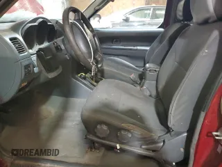 2004 Nissan Frontier 4WD SVE SuperCharger with VIN 1N6MD26Y14C409379, listed as a Copart auction lot 88594915 with 173,116 mi miles and Clean Title. Bid and sale history available at carsss.com. Image 7.