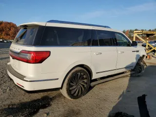 2021 Lincoln Navigator Black Label z VIN 5LMJJ3TT5MEL00238, wystawiony jako Copart lot #76951964 z przebiegiem 69 712 mil mil oraz Szkoda całkowita • Salvage title. Historia ofert i sprzedaży dostępna na DreamBid. Obrazek 3.