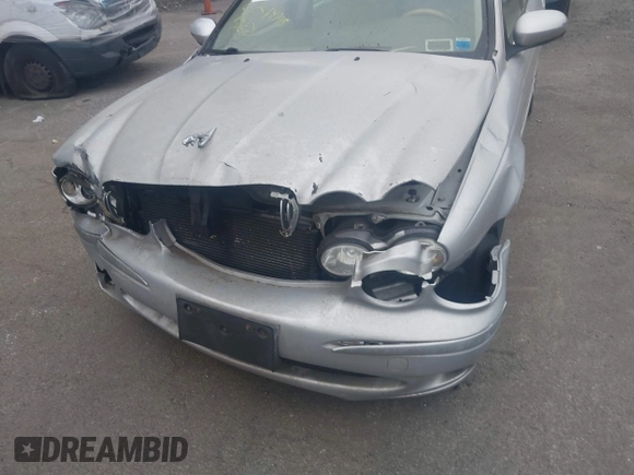 2004 Jaguar X-Type z VIN SAJEA51CX4WE01300, wystawiony jako IAAI lot #42514993 z przebiegiem 95 525 mil mil oraz . Historia ofert i sprzedaży dostępna na DreamBid. Obrazek 6.