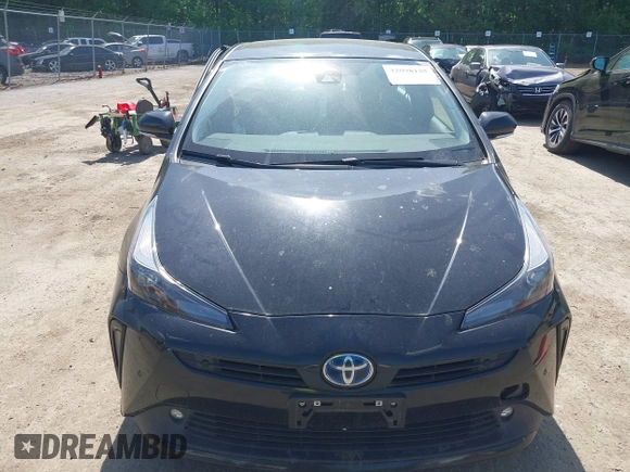 2022 Toyota Prius L Eco with VIN JTDKAMFU0N3175619, listed as a IAAI auction lot 42098135 with 72,984 mi miles and . Bid and sale history available at DreamBid. Image 12.